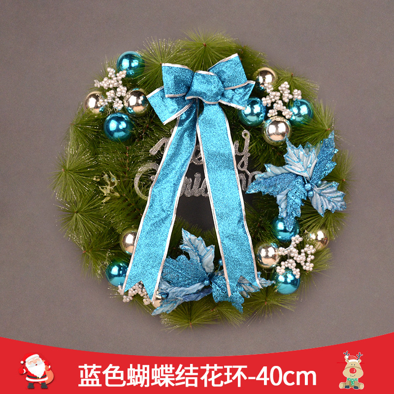 青いリボンの花輪は40 cmです。