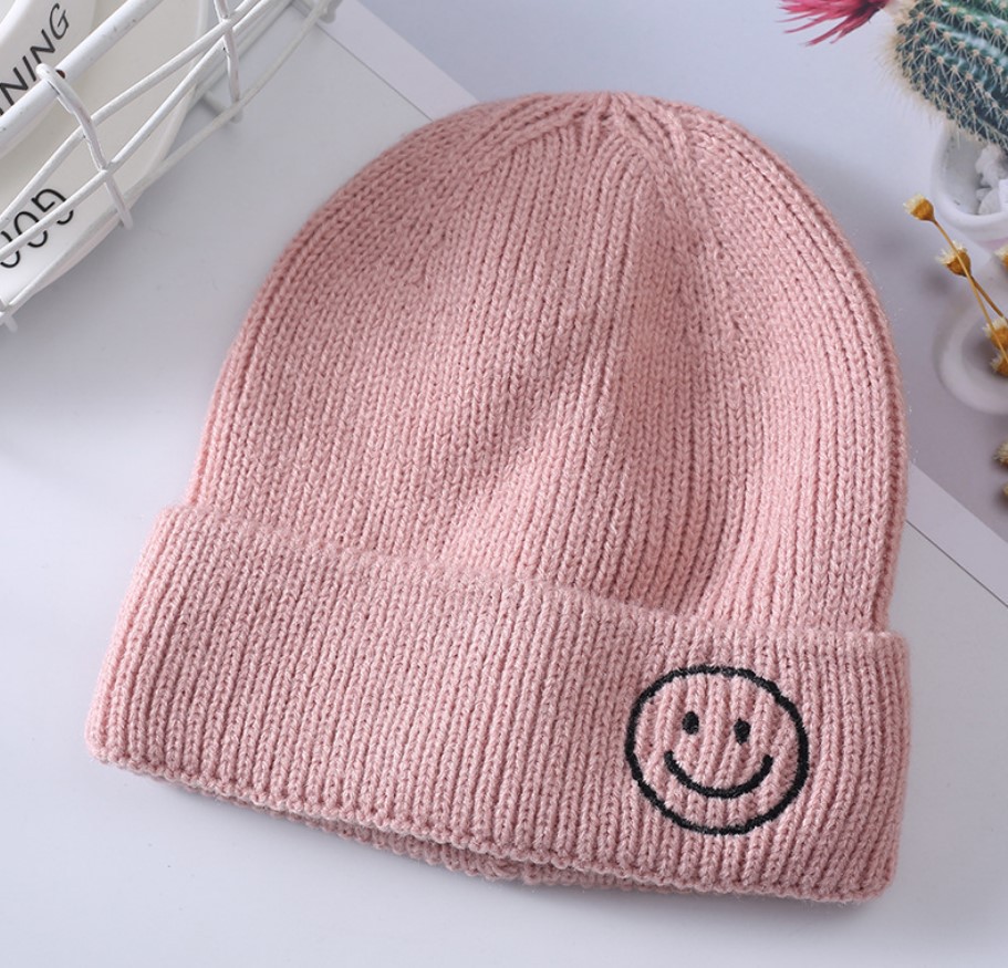 ピンクの毛糸の帽子