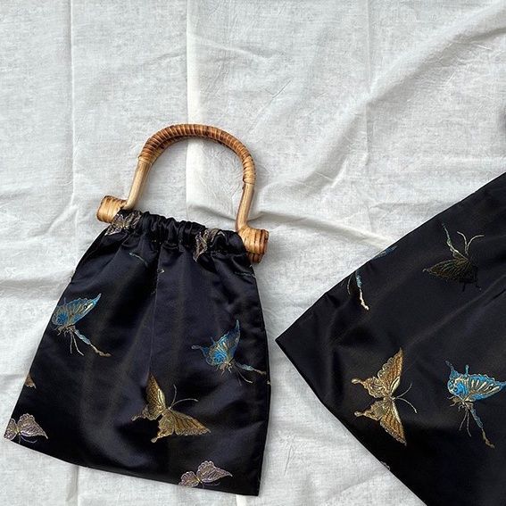 黒金蝶の竹編みハンドバッグ-トランペット