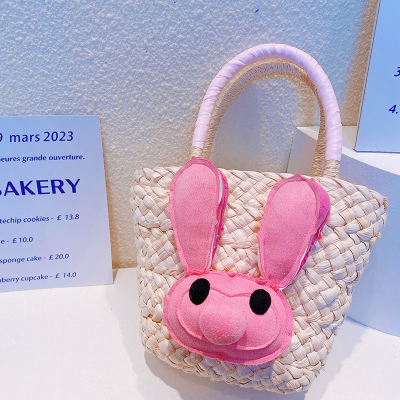 1.ピンクのウサギの草編みバッグ